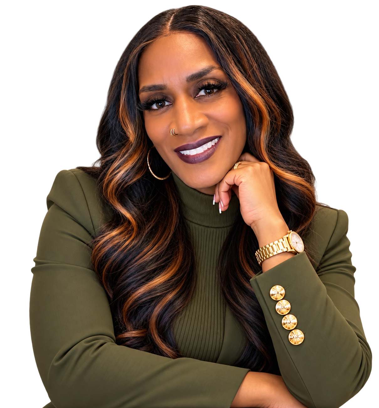 Vonda Morton smiling, resting her chin on her hand, wearing an olive-green blazer and gold watch
